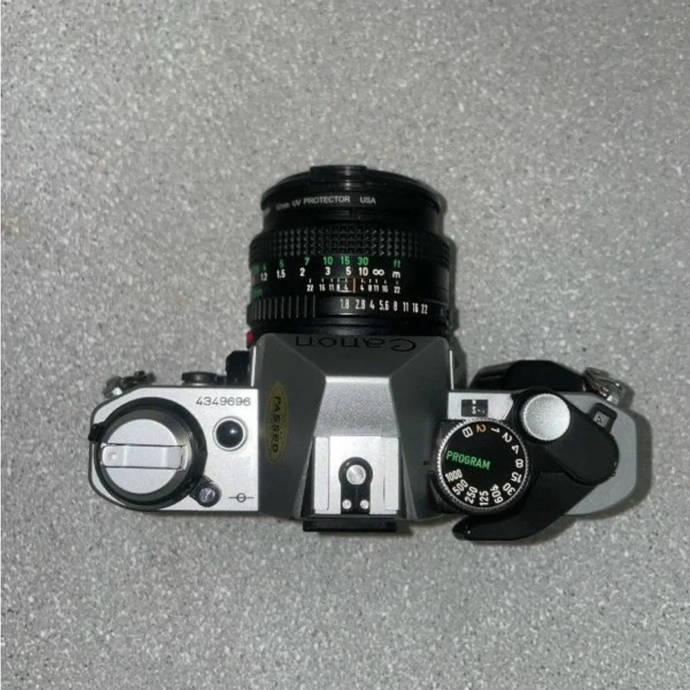 Canon AE-1 Program Film Camera - Silver and Black